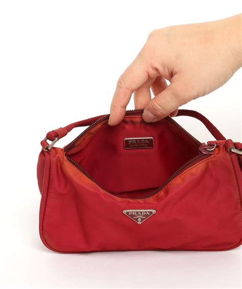 red prada cosmetic bag|Prada nylon pouch bag.